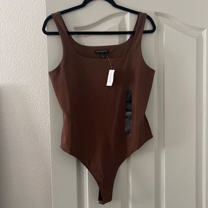 NWT double lined body suit